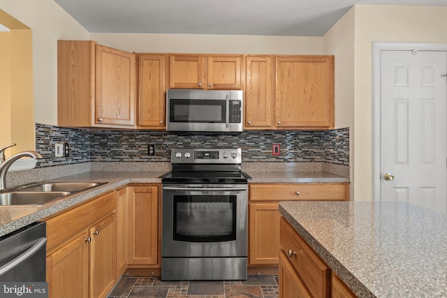 5522 Trout Run Rd, Clinton, MD 20735 - kitchen featuring stainless steel appliances, decorative backsplash, and dark stone finish floors