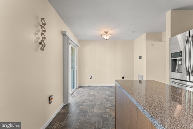 5522 Trout Run Rd, Clinton, MD 20735 - kitchen with stone finish flooring and stainless steel fridge with ice dispenser