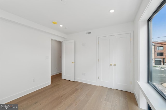 919 S 11th St Unit B, Philadelphia, PA 19147 - unfurnished bedroom with light wood-style floors, recessed lighting, and a closet