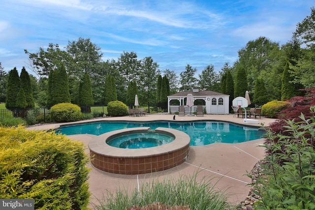 2553 Stone Hill Rd, Harleysville, PA 19438 - view of swimming pool featuring a patio and a pool with connected hot tub