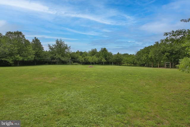 2553 Stone Hill Rd, Harleysville, PA 19438 - view of grassy yard with a wooded view