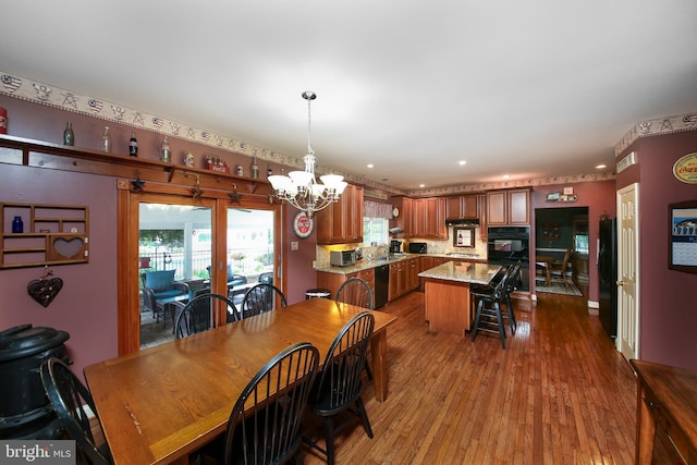 2553 Stone Hill Rd, Harleysville, PA 19438 - dining space featuring a chandelier, wood-type flooring, and recessed lighting