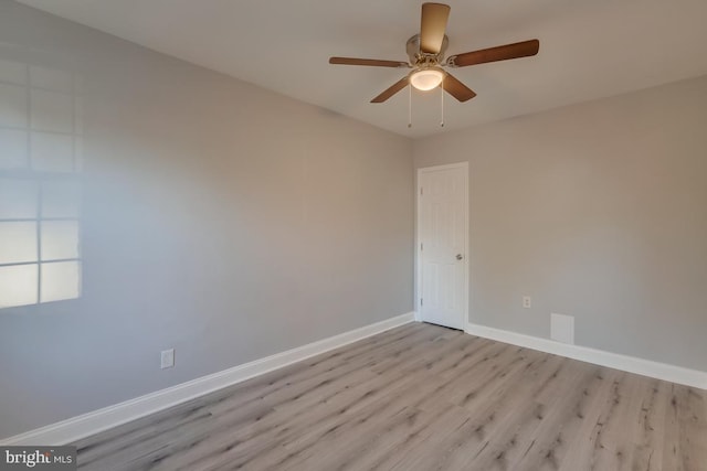 537 Newcomb St SE, Washington, DC 20032 - empty room with wood finished floors and a ceiling fan