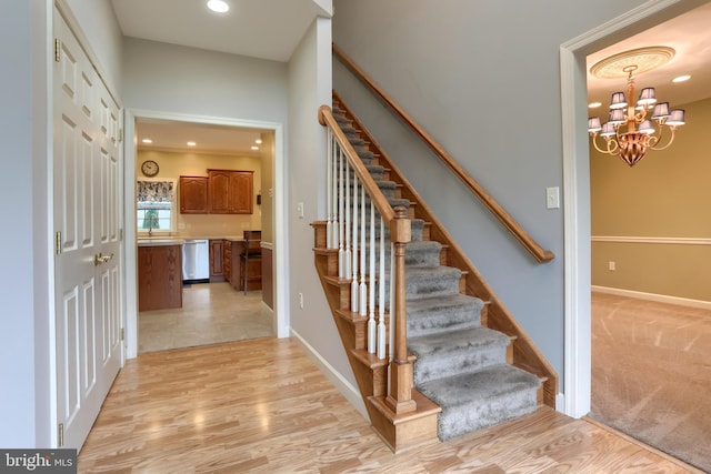 395 Olde Meadow Ln, Lebanon, PA 17042 - staircase featuring a chandelier, recessed lighting, and wood finished floors