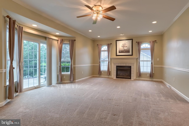 395 Olde Meadow Ln, Lebanon, PA 17042 - unfurnished living room with crown molding, a ceiling fan, carpet flooring, a tiled fireplace, and recessed lighting