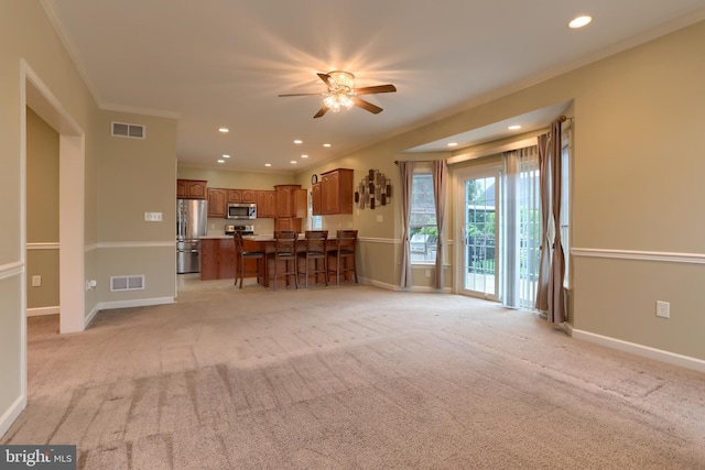 395 Olde Meadow Ln, Lebanon, PA 17042 - living area featuring crown molding, a ceiling fan, recessed lighting, and light carpet