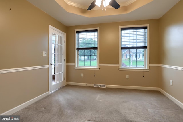 395 Olde Meadow Ln, Lebanon, PA 17042 - carpeted empty room with ceiling fan, a raised ceiling, and ornamental molding