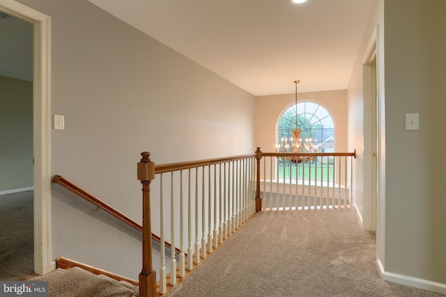 395 Olde Meadow Ln, Lebanon, PA 17042 - hallway featuring carpet, a chandelier, an upstairs landing, and vaulted ceiling