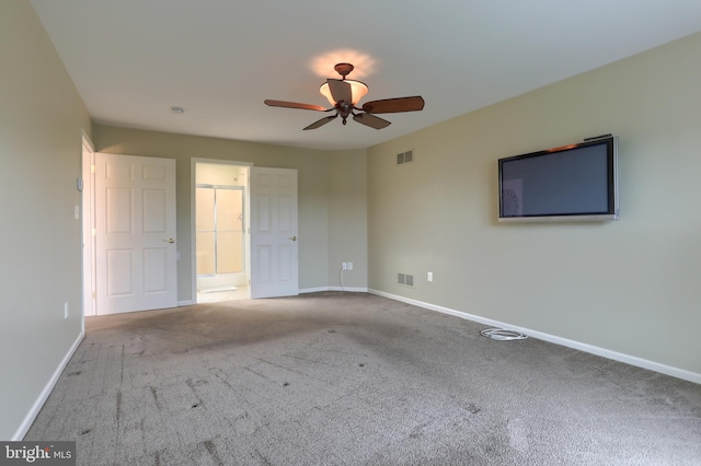 395 Olde Meadow Ln, Lebanon, PA 17042 - unfurnished bedroom featuring carpet floors, connected bathroom, and a ceiling fan