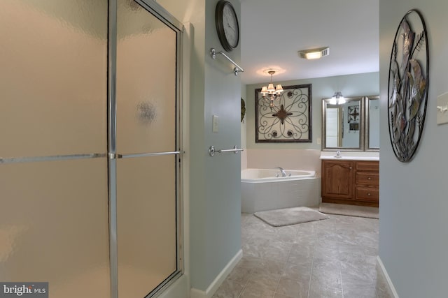 395 Olde Meadow Ln, Lebanon, PA 17042 - bathroom with vanity, a garden tub, a shower stall, and a chandelier