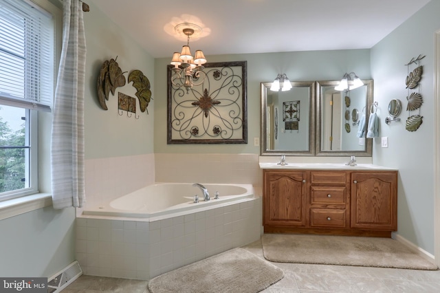395 Olde Meadow Ln, Lebanon, PA 17042 - bathroom with a bath, double vanity, a chandelier, and tile patterned flooring