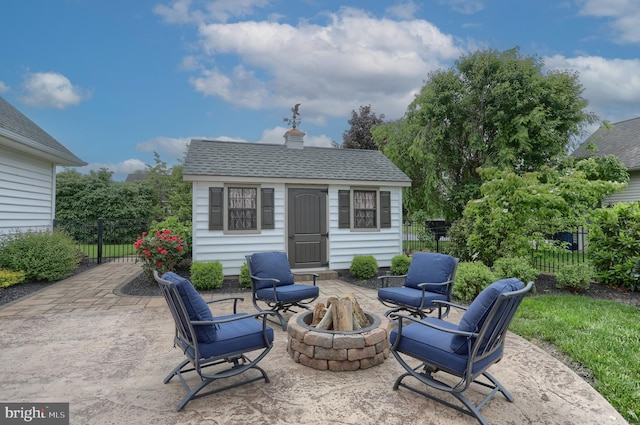 395 Olde Meadow Ln, Lebanon, PA 17042 - view of patio featuring an outdoor fire pit and an outbuilding