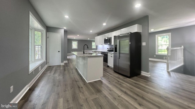519 Clarks Run Rd, La Plata, MD 20646 - kitchen featuring stainless steel appliances, a kitchen island with sink, white cabinets, recessed lighting, and plenty of natural light
