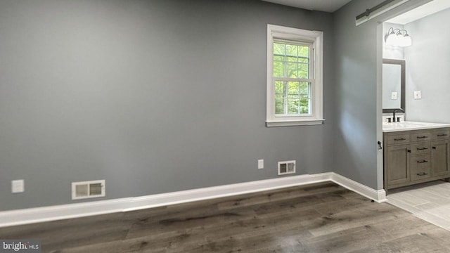 519 Clarks Run Rd, La Plata, MD 20646 - empty room featuring wood finished floors and a sink