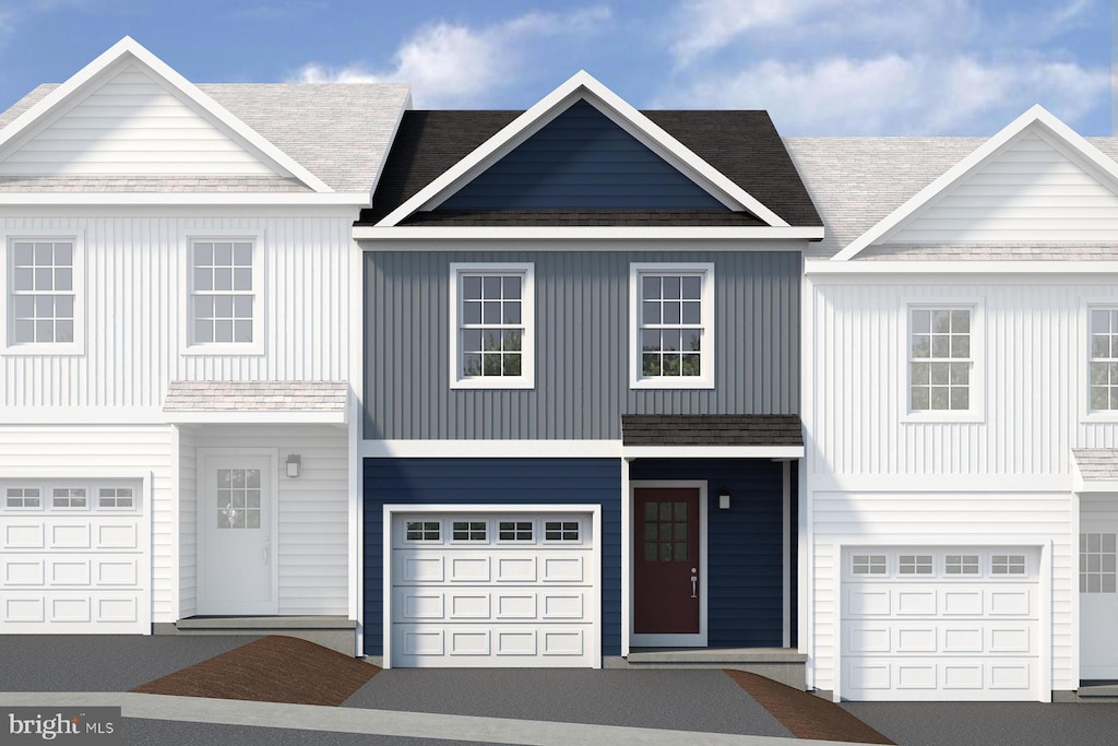 169 Highpoint Park Dr, Pleasant Gap, PA 16823 - townhome / multi-family property with a garage and board and batten siding