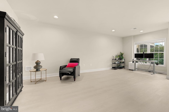 22974 Weybridge Sq, Broadlands, VA 20148 - living area featuring wood finished floors and recessed lighting