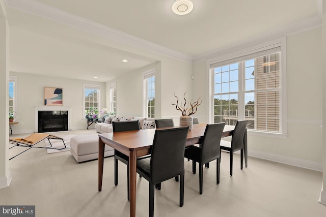 22974 Weybridge Sq, Broadlands, VA 20148 - dining space with crown molding and a fireplace