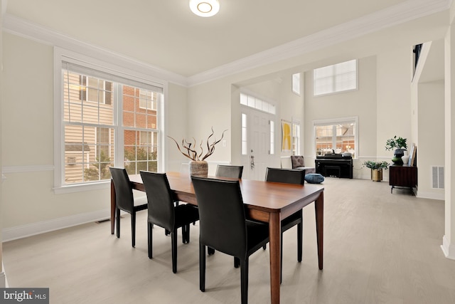 22974 Weybridge Sq, Broadlands, VA 20148 - dining area featuring ornamental molding and wood finished floors