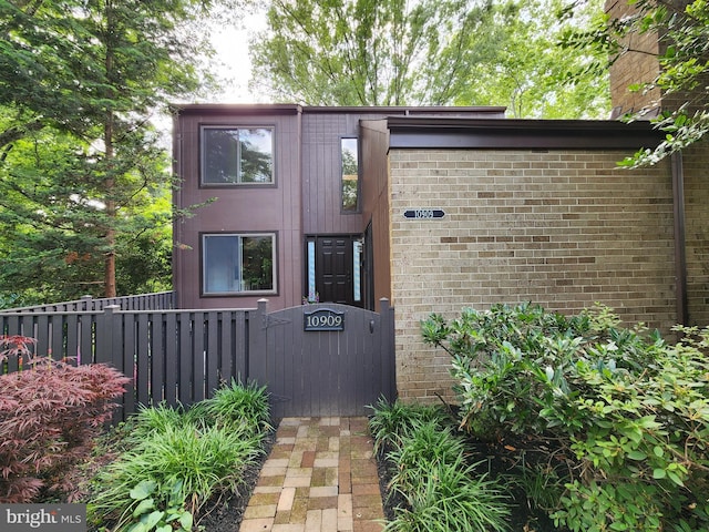10909 Knights Bridge Ct, Reston, VA 20190 - view of front of home featuring brick siding