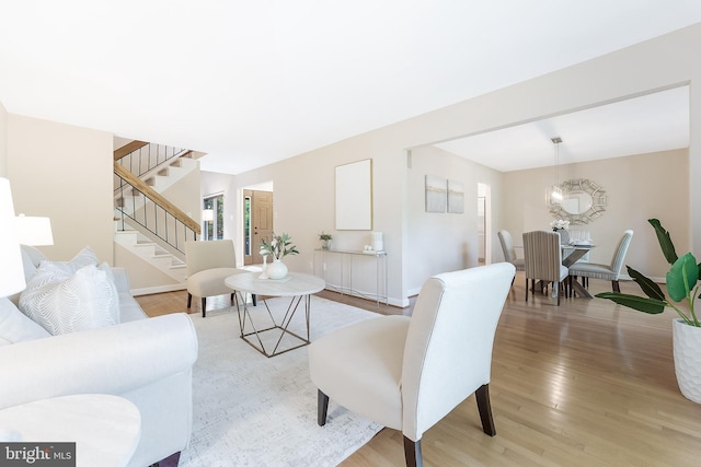 10909 Knights Bridge Ct, Reston, VA 20190 - living area with light wood-style flooring and stairs