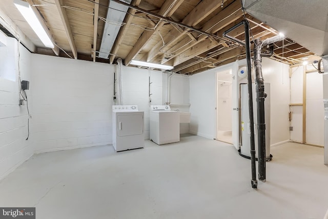 10909 Knights Bridge Ct, Reston, VA 20190 - unfinished below grade area featuring washing machine and clothes dryer, water heater, and concrete block wall