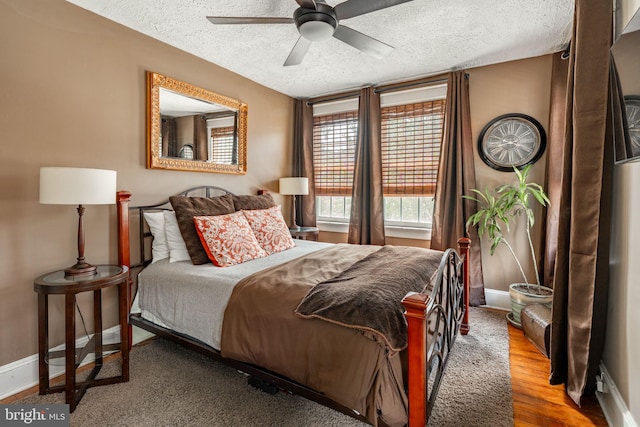 227 Ruby St, Lancaster, PA 17603 - bedroom with a textured ceiling, wood finished floors, and ceiling fan