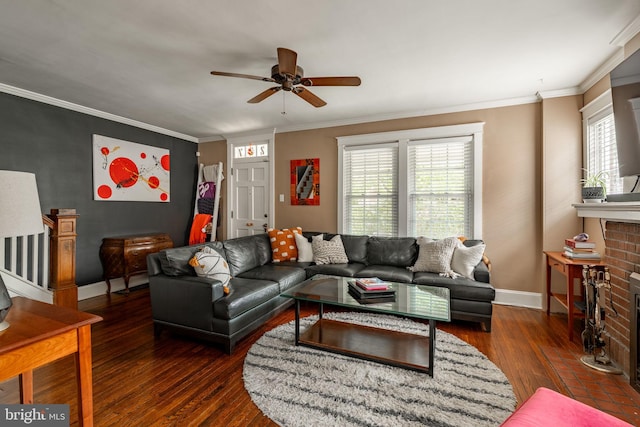 227 Ruby St, Lancaster, PA 17603 - living room featuring hardwood / wood-style flooring, ceiling fan, a fireplace, ornamental molding, and stairs