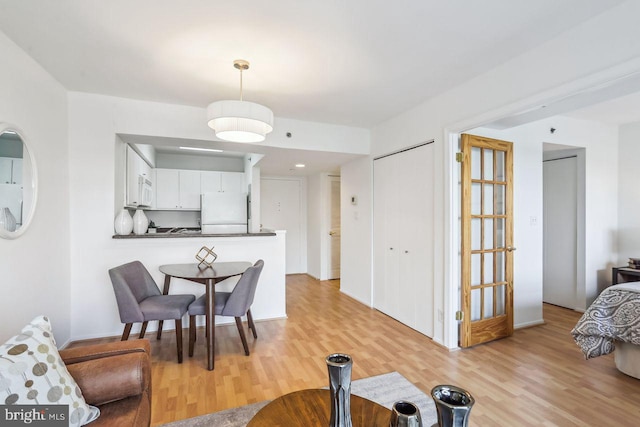 1401 17th St NW Unit 610, Washington, DC 20036 - dining room with light wood-style flooring