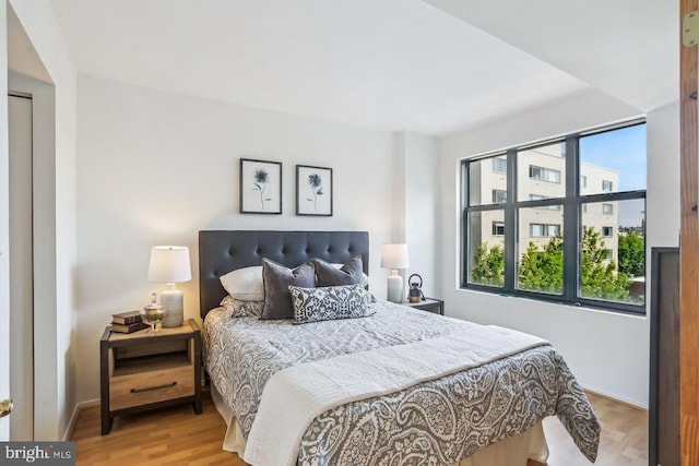 1401 17th St NW Unit 610, Washington, DC 20036 - bedroom featuring light wood-style floors and baseboards