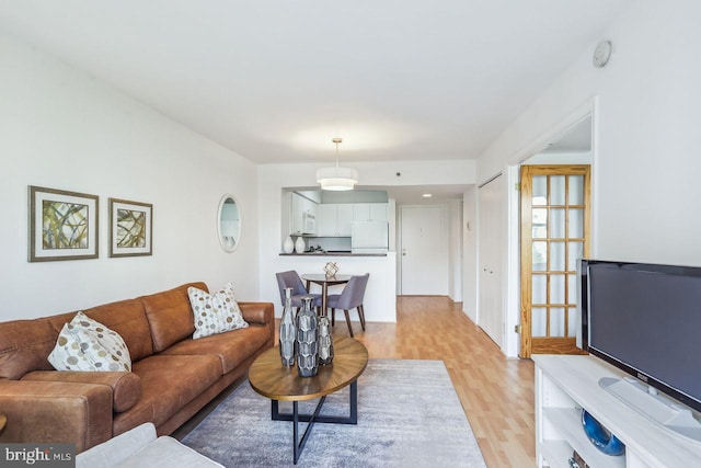 1401 17th St NW Unit 610, Washington, DC 20036 - living area with light wood finished floors