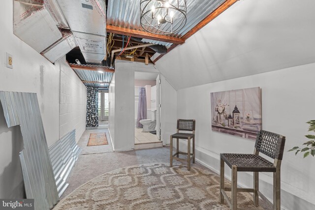 352 Concord Rd, Glen Mills, PA 19342 - hallway with carpet, lofted ceiling, and a chandelier