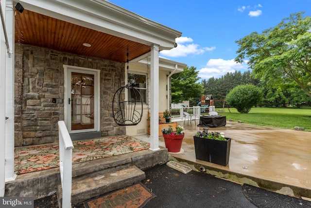 352 Concord Rd, Glen Mills, PA 19342 - entrance to property featuring stone siding, a lawn, and a porch