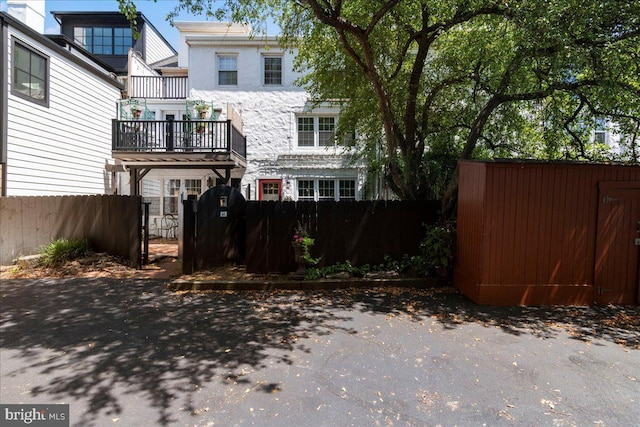 67 W Ferry St, New Hope, PA 18938 - rear view of property with a gate and stone siding
