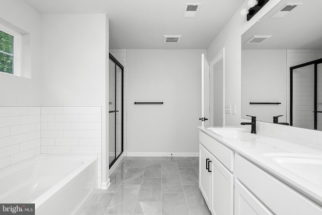 4913 S Broad St, Hamilton, NJ 08620 - full bath with a garden tub, a stall shower, and double vanity