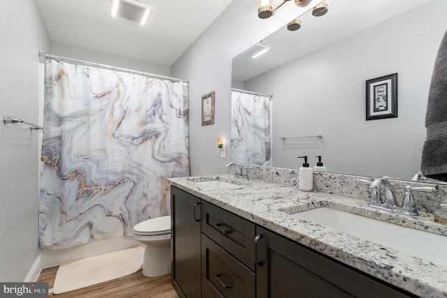 309 Pierson Rd, Lititz, PA 17543 - full bath with double vanity, wood finished floors, and a shower with curtain