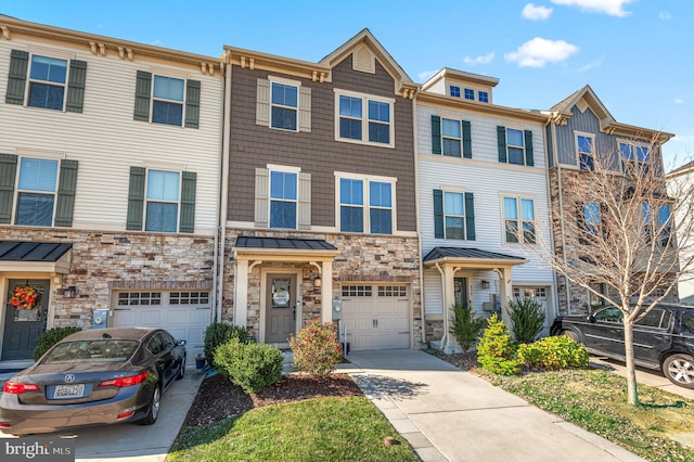 932 Dawes Ct, Bel Air, MD 21014 - townhome / multi-family property with driveway, stone siding, and an attached garage