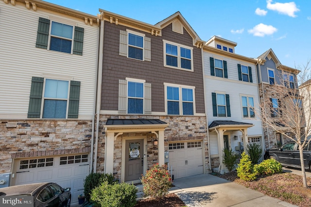 932 Dawes Ct, Bel Air, MD 21014 - view of property featuring a garage, stone siding, and concrete driveway
