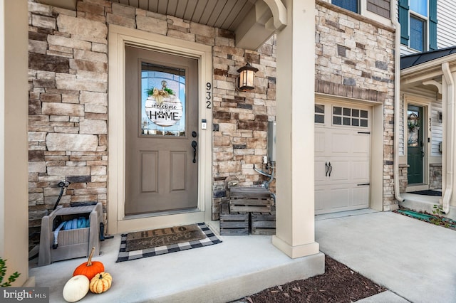 932 Dawes Ct, Bel Air, MD 21014 - property entrance featuring stone siding, driveway, and an attached garage