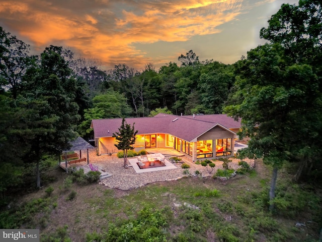 302 Fox Run Rd, Wardensville, WV 26851 - rear view of house with a patio and a forest view