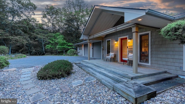 302 Fox Run Rd, Wardensville, WV 26851 - view of deck at dusk
