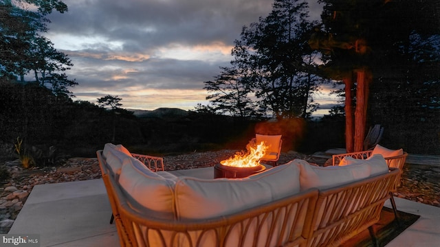 302 Fox Run Rd, Wardensville, WV 26851 - view of patio featuring an outdoor living space with a fire pit