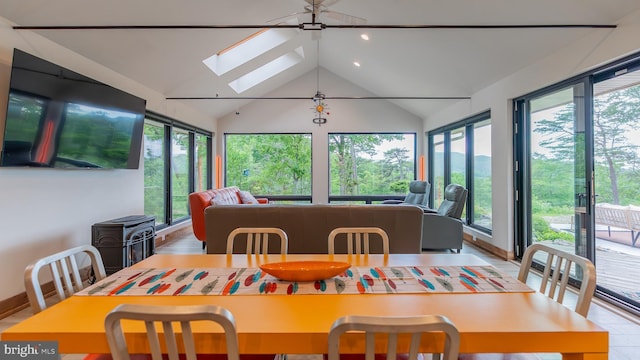 302 Fox Run Rd, Wardensville, WV 26851 - dining space featuring a skylight, lofted ceiling, and recessed lighting