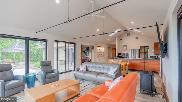 302 Fox Run Rd, Wardensville, WV 26851 - living area featuring vaulted ceiling, recessed lighting, ceiling fan, and light wood finished floors