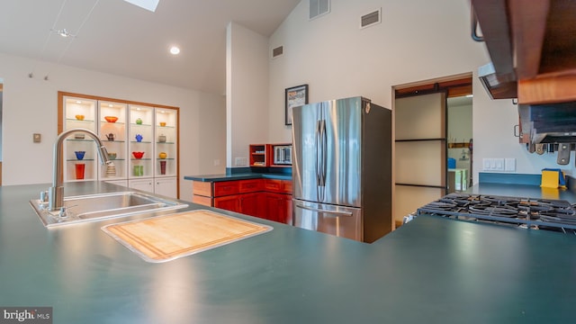 302 Fox Run Rd, Wardensville, WV 26851 - kitchen with freestanding refrigerator and vaulted ceiling