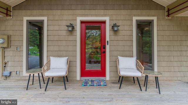 302 Fox Run Rd, Wardensville, WV 26851 - view of exterior entry featuring a wooden deck
