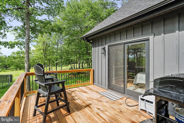 130 Lodestone Way, Mc Henry, MD 21541 - wooden terrace with view of wooded area and a grill