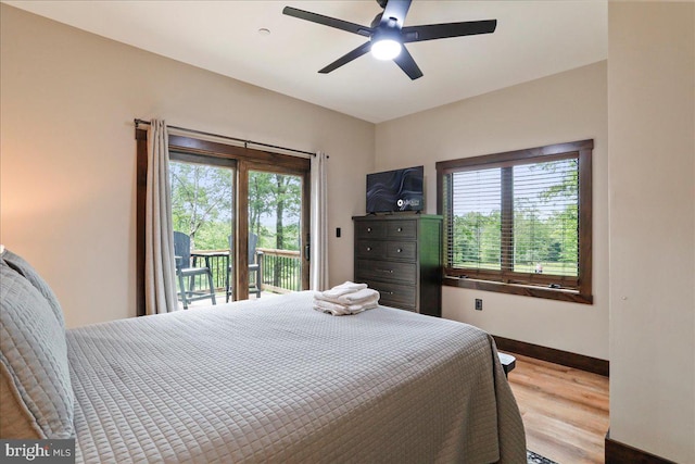 130 Lodestone Way, Mc Henry, MD 21541 - bedroom with access to exterior, multiple windows, wood finished floors, and a ceiling fan