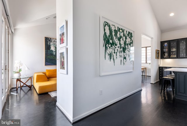 1823 Belmont Rd NW Unit D, Washington, DC 20009 - hallway with high vaulted ceiling, recessed lighting, and dark wood-style flooring