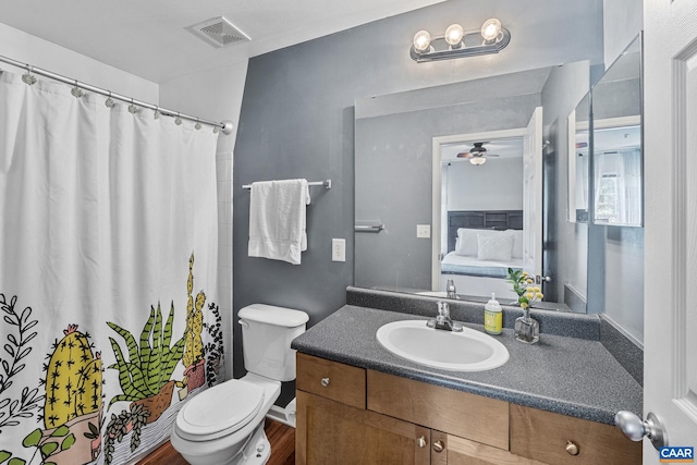 765 Denali Way Unit 204, Charlottesville, VA 22903 - full bathroom featuring vanity, ensuite bathroom, a ceiling fan, a shower with shower curtain, and wood finished floors