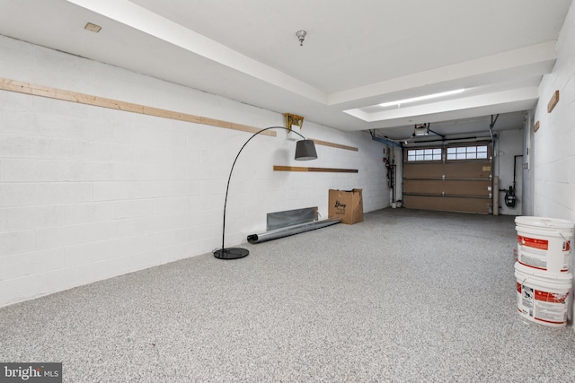 1013 S Decker Ave, Baltimore, MD 21224 - garage with concrete block wall and a garage door opener